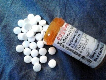 This pill bottle fulls of opiate pain pills could get you 20 years or more in North Carolina. (wikimedia.org)