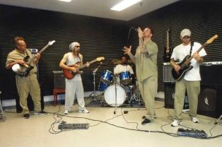 Rockin' the joint at Yazoo City FCI. That's Emery on bass on the left. (cannabisculture.com)