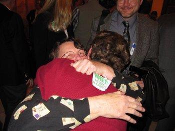 patients share victory hug after passage of legislation, January 2010