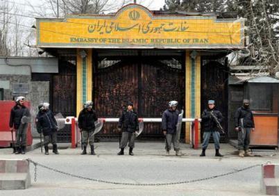 Afghan police guard the Iranian Embassy during January 2011 protests against Iranian executions of Afghans (wikimedia.org