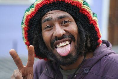 The Jamaican government just might give this Rastaman something else to smile about. (Image via Wikimedia)