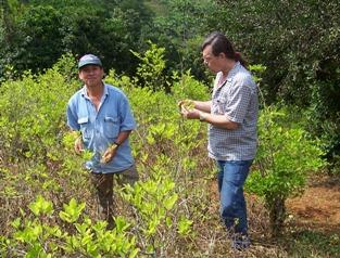 Yours truly with Peruvian coca farmer. The government wants to eradicate his crop. (Phil Smith/stopthedrugwar.org)