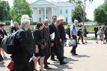 LEAP members pass by the White House as they deliver their report to the drug czar's office.