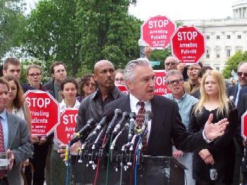 Rep. Hinchey addresses a 2005 press conference on medical marijuana, as Montel Williams awaits his turn at the podium.