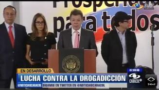 Santos and Petro at press conference announcing the initiative (screen shot from Caracol TV)