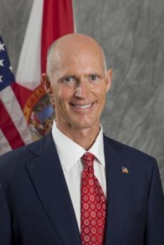 Gov. Rick Scott (R) scores political points on the backs of the poor. (Image courtesy state of Florida) 
