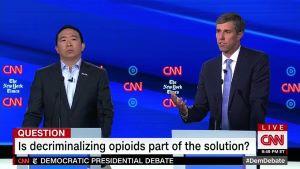 Andrew Yang and Beto O'Rourke both came out in support of drug decriminalization at Tuesday night's debate. (CNN screen grab)